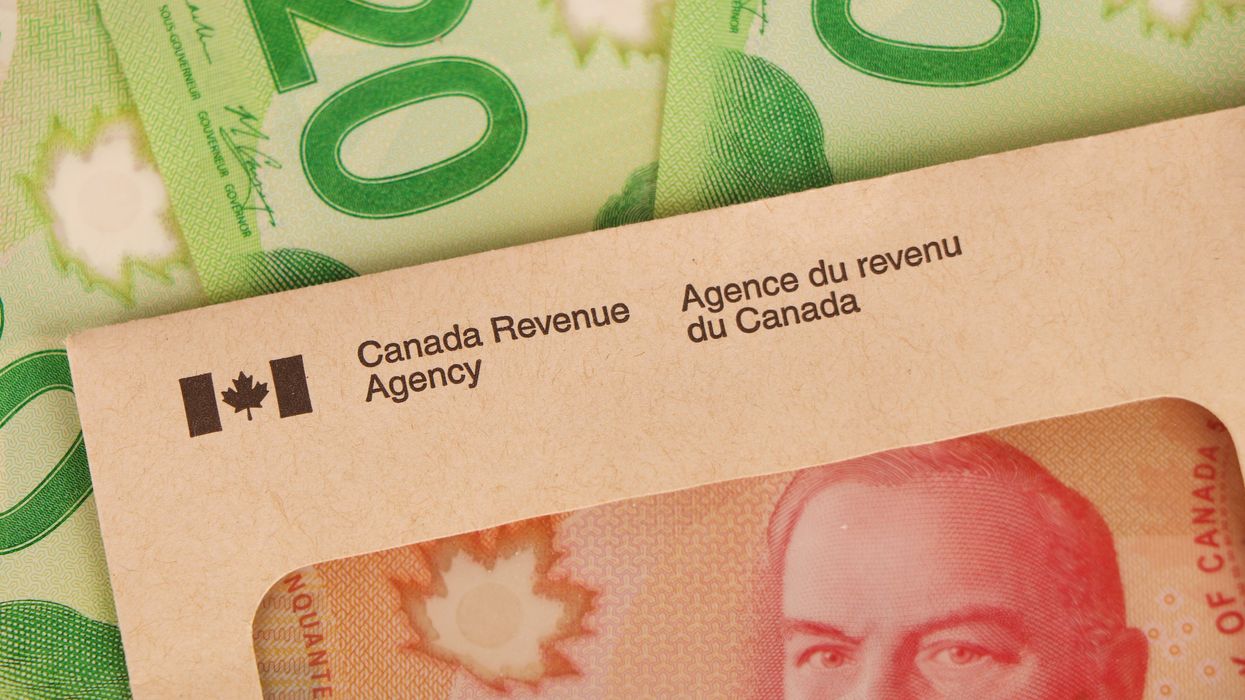 Canadian money and an envelope from the CRA (illustrative).