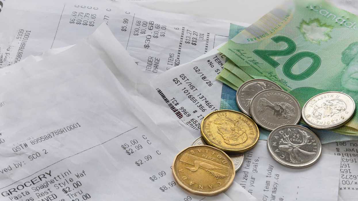 Canadian money and grocery receipts.