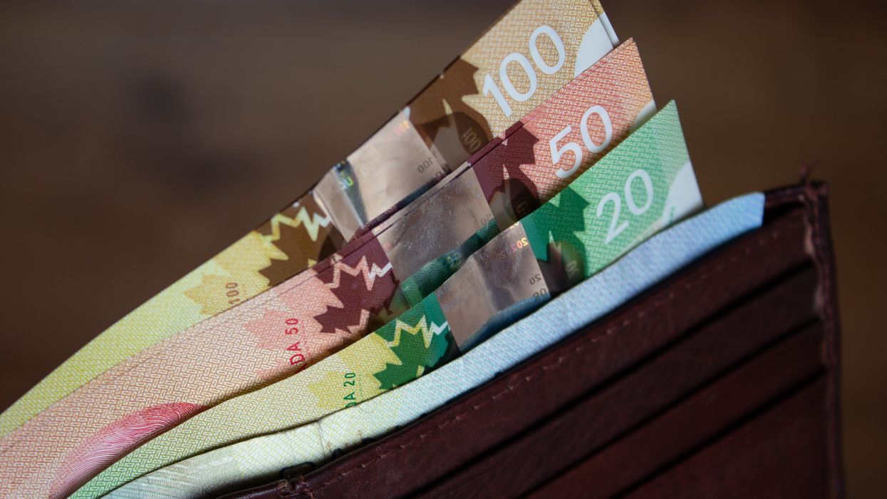 Canadian money in a wallet.