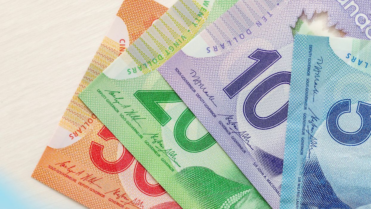 Canadian money, including a $50, $20, $10 and $5 bill.