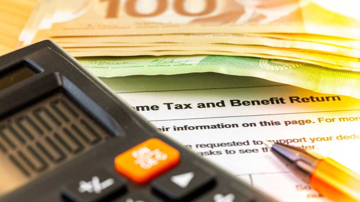 Canadian money, tax forms and calculator.