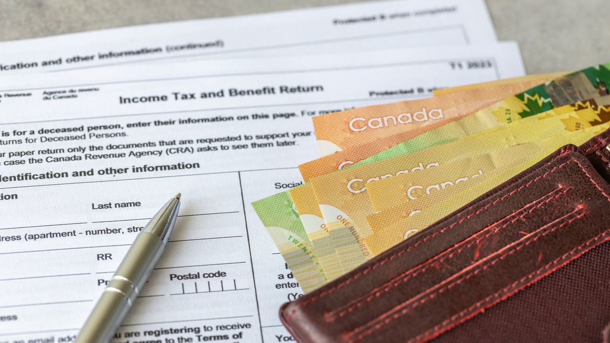 Canadian tax forms and money.