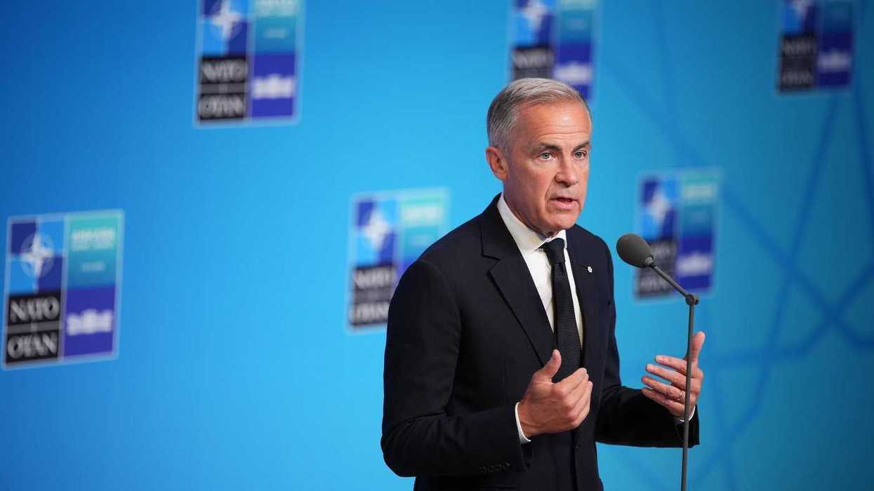 Carney defends appointing aide to Senate