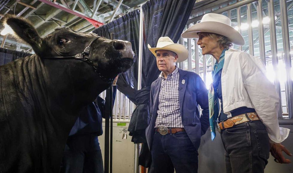 Carney wraps up Stampede visit flipping pancakes