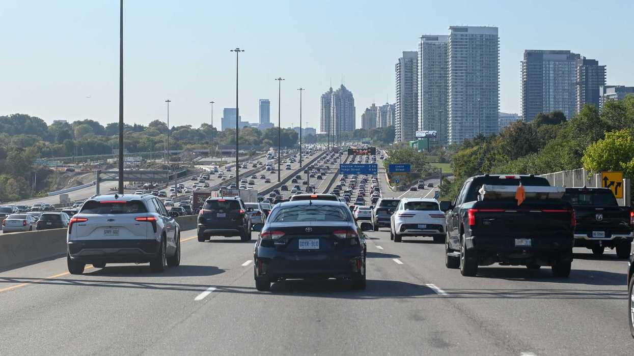 cars and trucks on highway in ontario