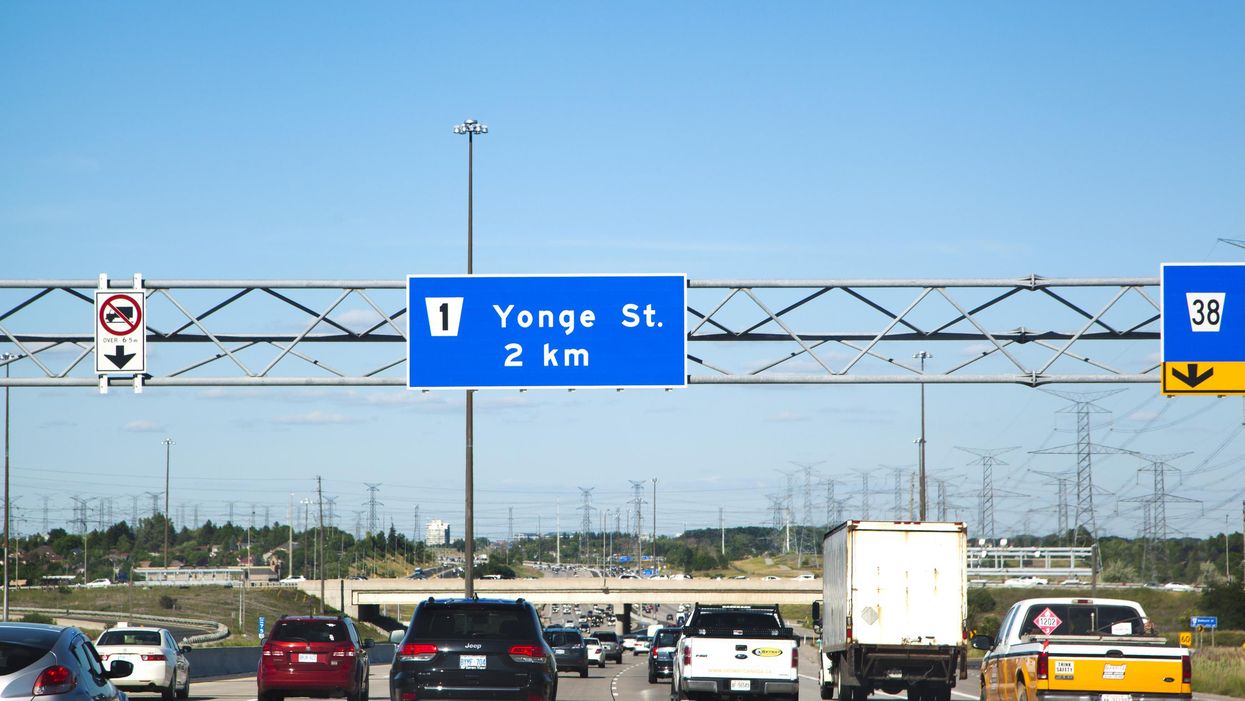 Cars driving down an Ontario highway.