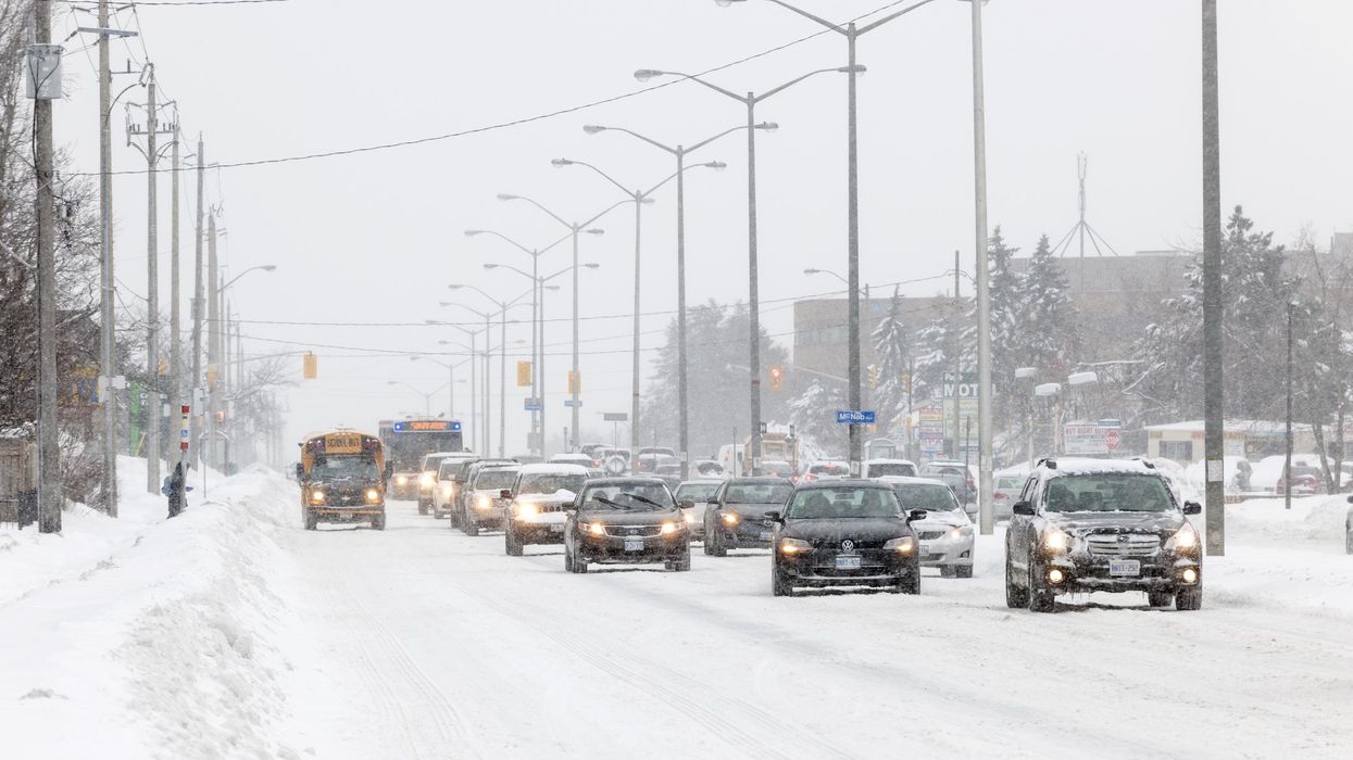 Cars driving in the snow in Ontario.
