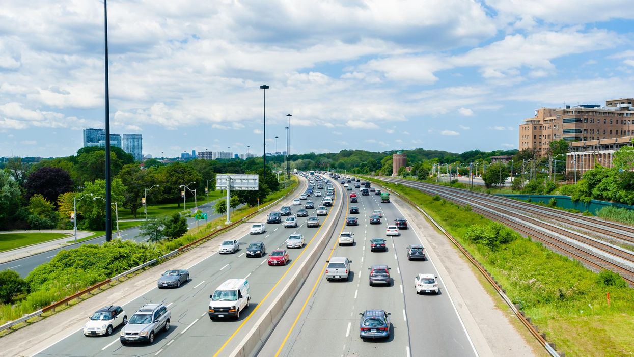 Cars driving on a highway in Toronto.