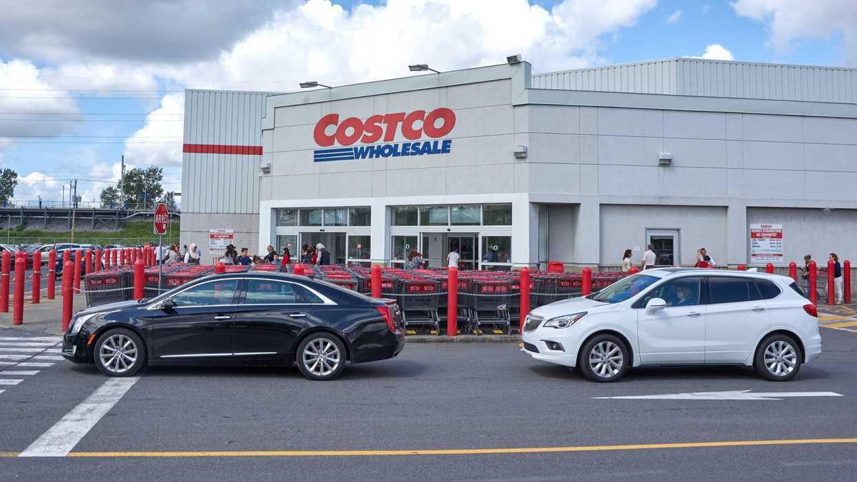 cars in parking lot in front of costco store in canada
