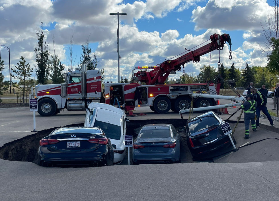 Cars in the sinkhole in Edmonton.