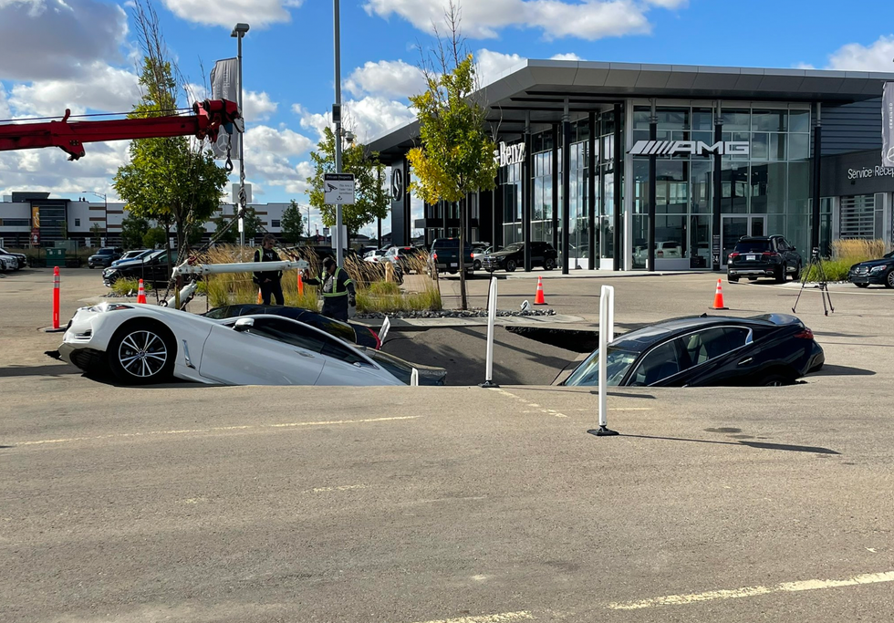 Cars in the sinkhole in Edmonton.