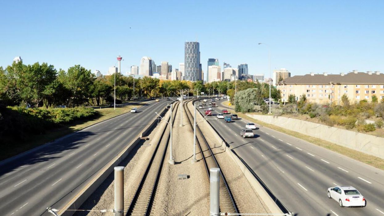 Cars on a road leading into Calgary.