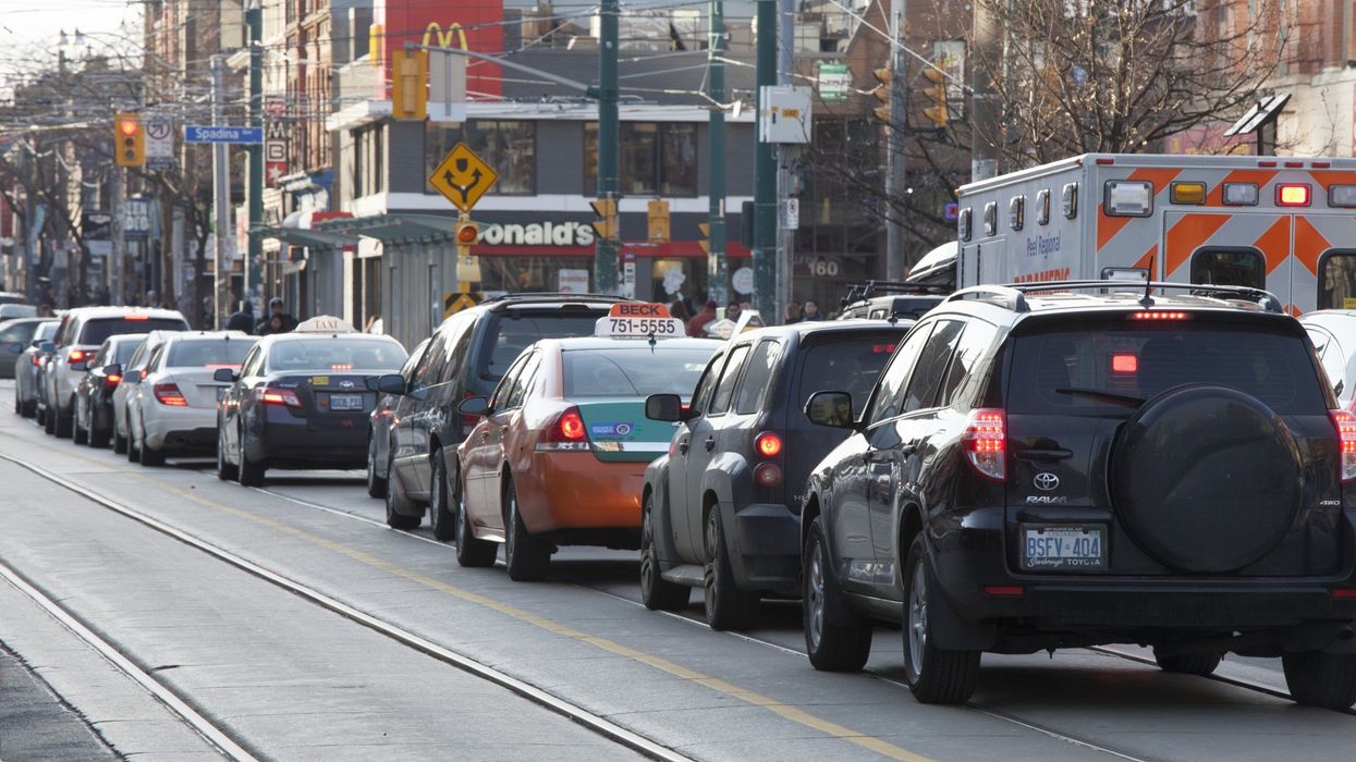 Cars on a street in Toronto.