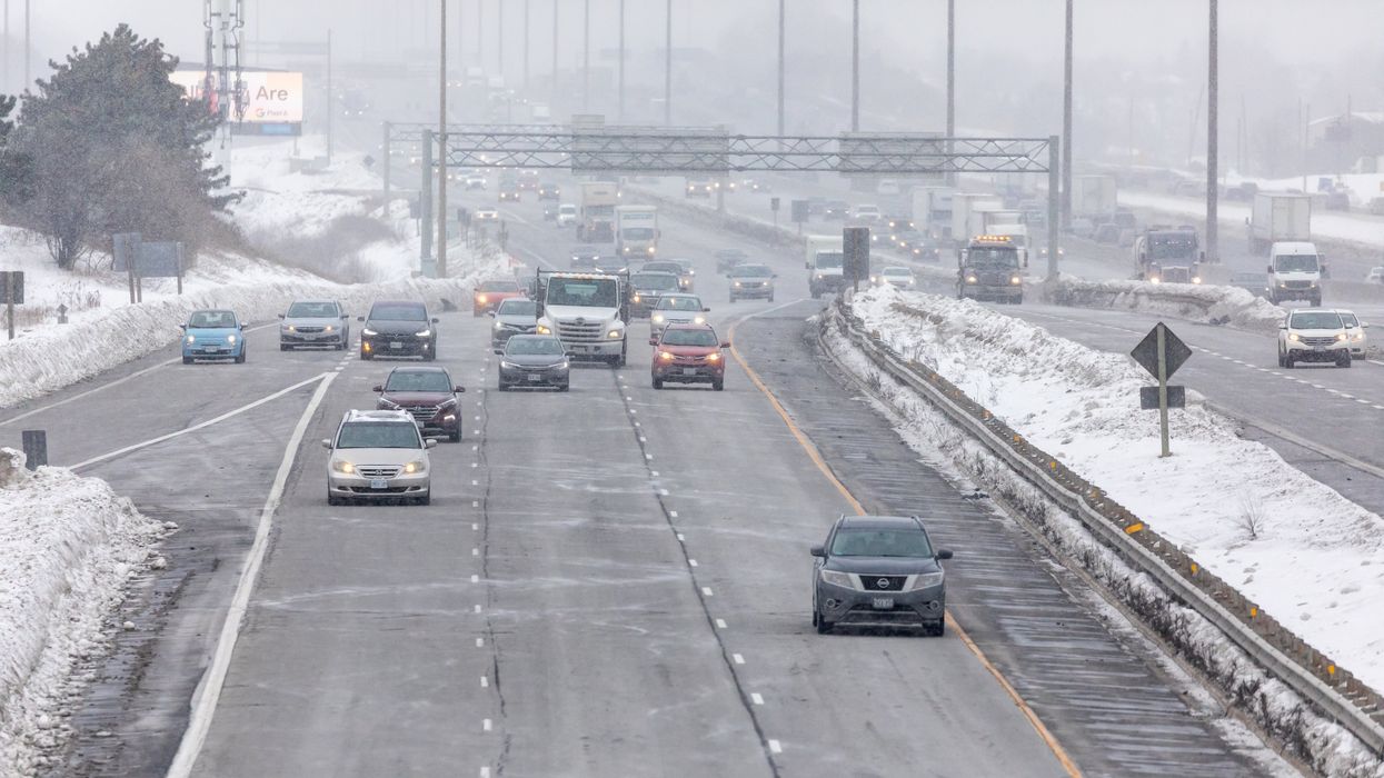 Cars on the highway in winter.