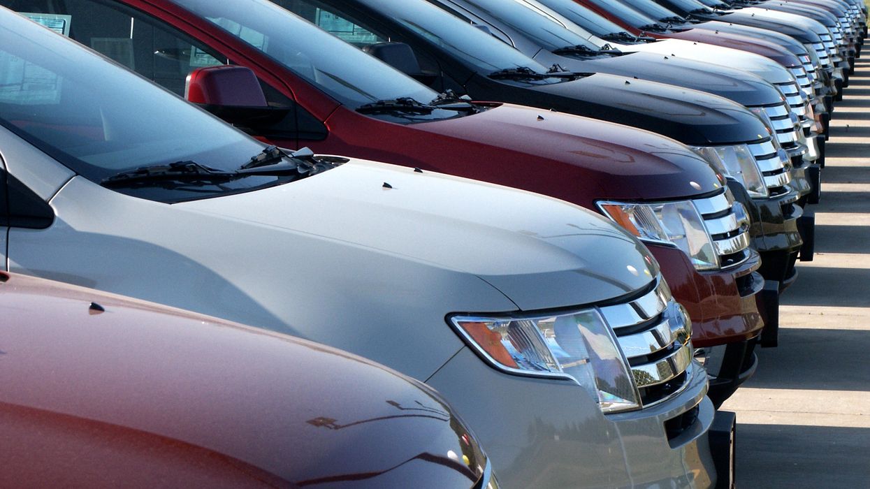 Cars parked in a lot.