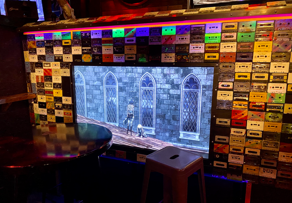 Cassette tapes line the walls inside Glitch bar.
