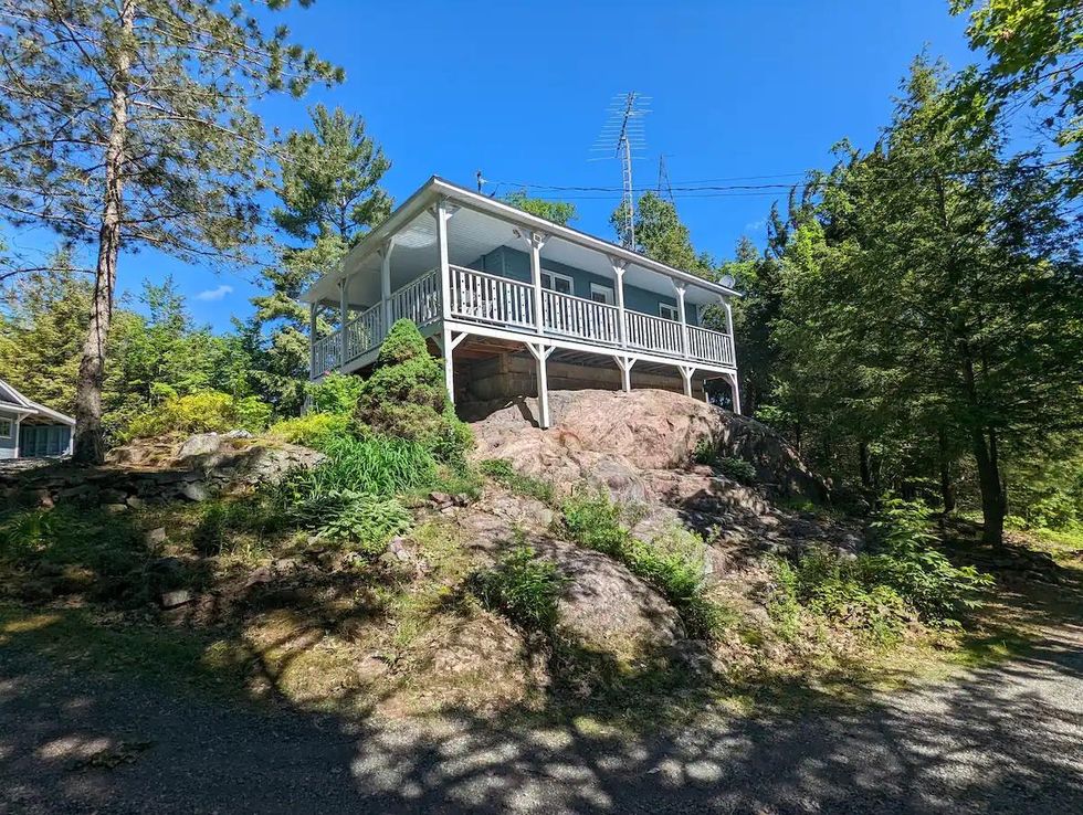 Charming chalet perched on a rocky escarpment.