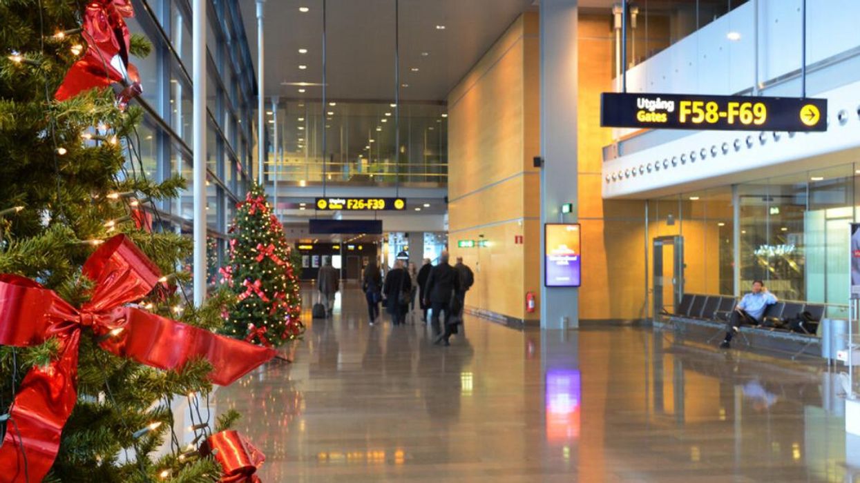 Christmas decorations inside an airport.