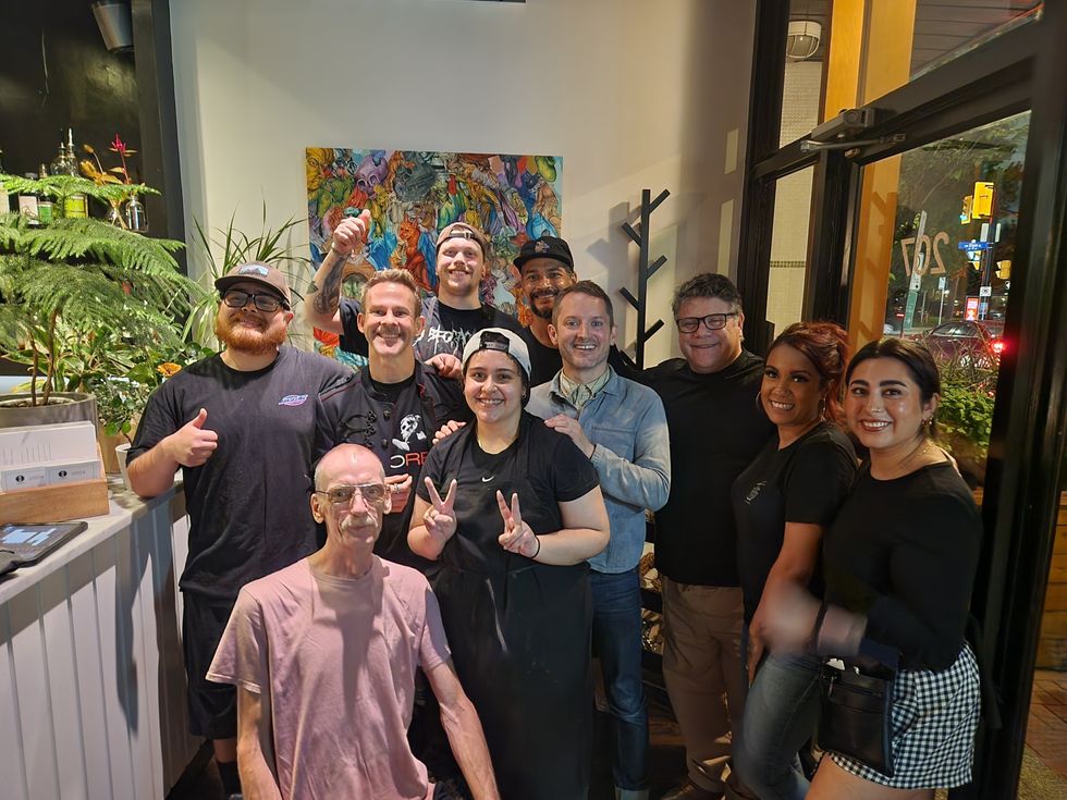 Citizen staff posing with Dom Monaghan, Elijah Wood and Sean Astin in Ottawa