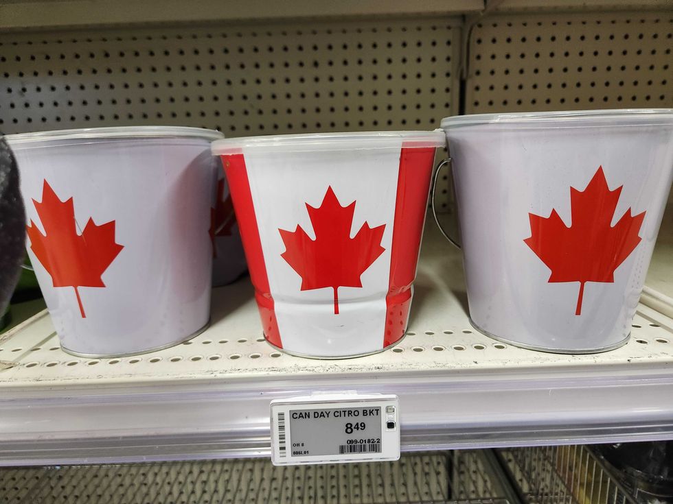 Citronella buckets with the maple leaf at Canadian Tire.