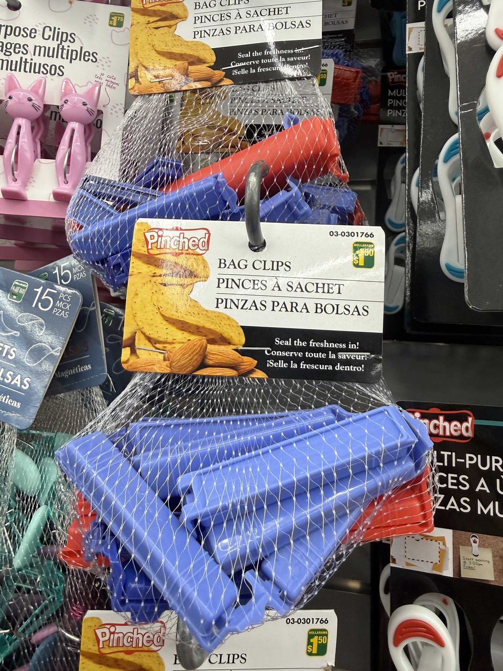 Clear bags filled with blue and red bag clips.
