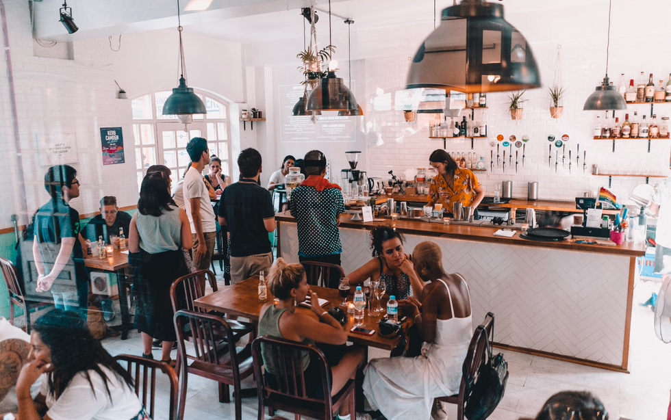 coffee shop with a line of people waiting for their order