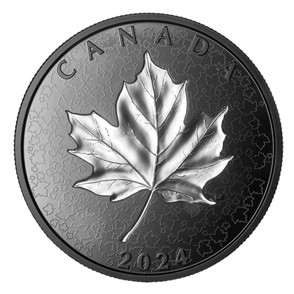 coin with black rhodium plating and a silver maple leaf