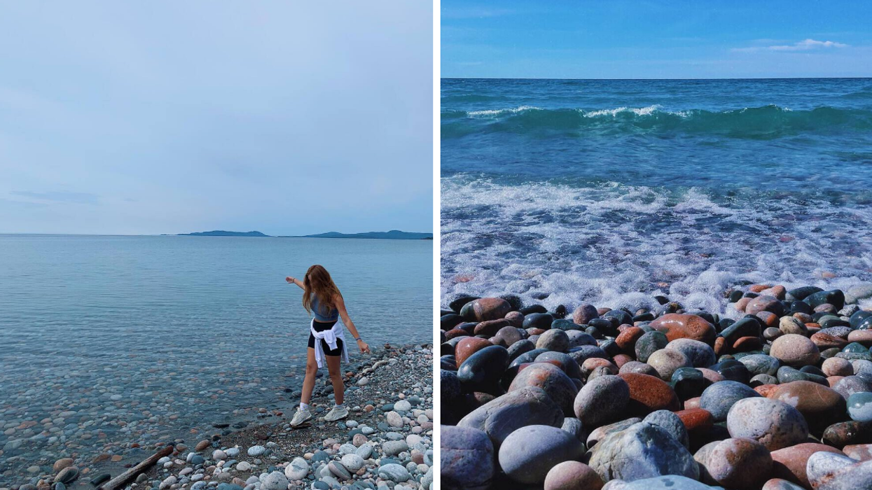 Colourful stones and blue water along the shores of Pebble Beach in Ontario.