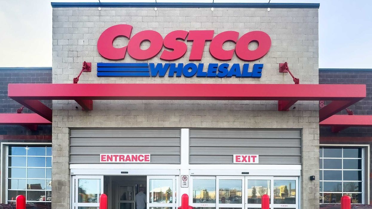 costco wholesale sign on exterior of store in canada