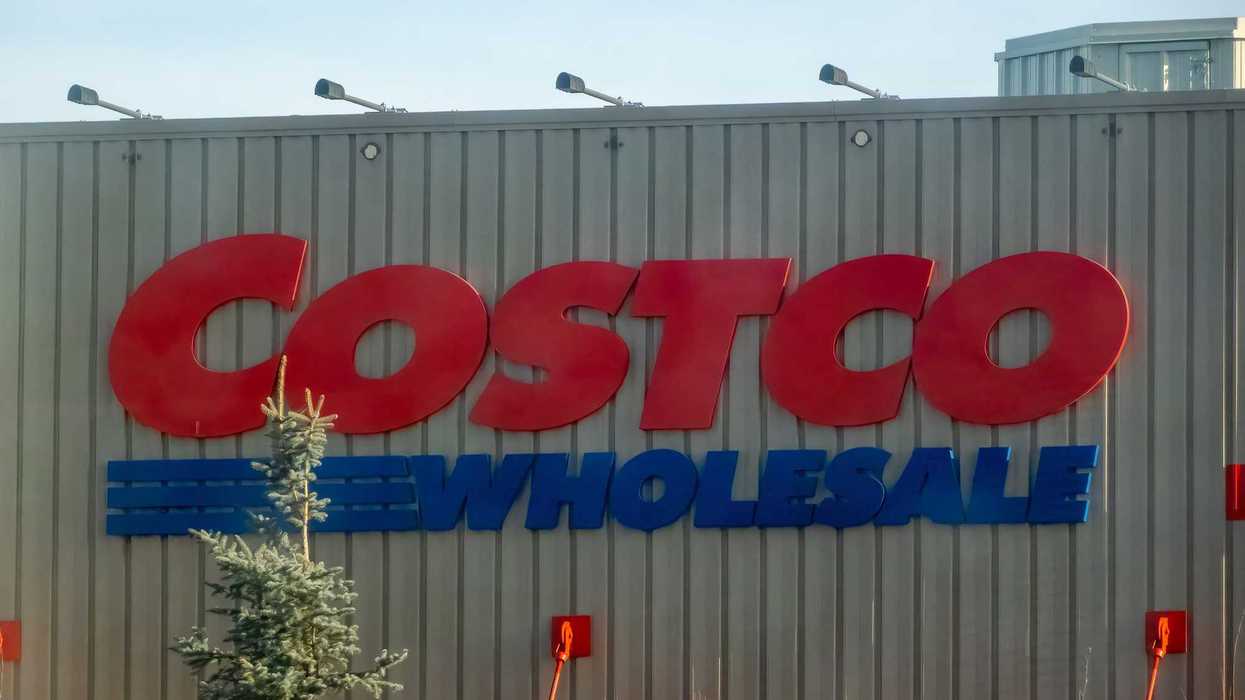 costco wholesale sign on exterior of store in canada