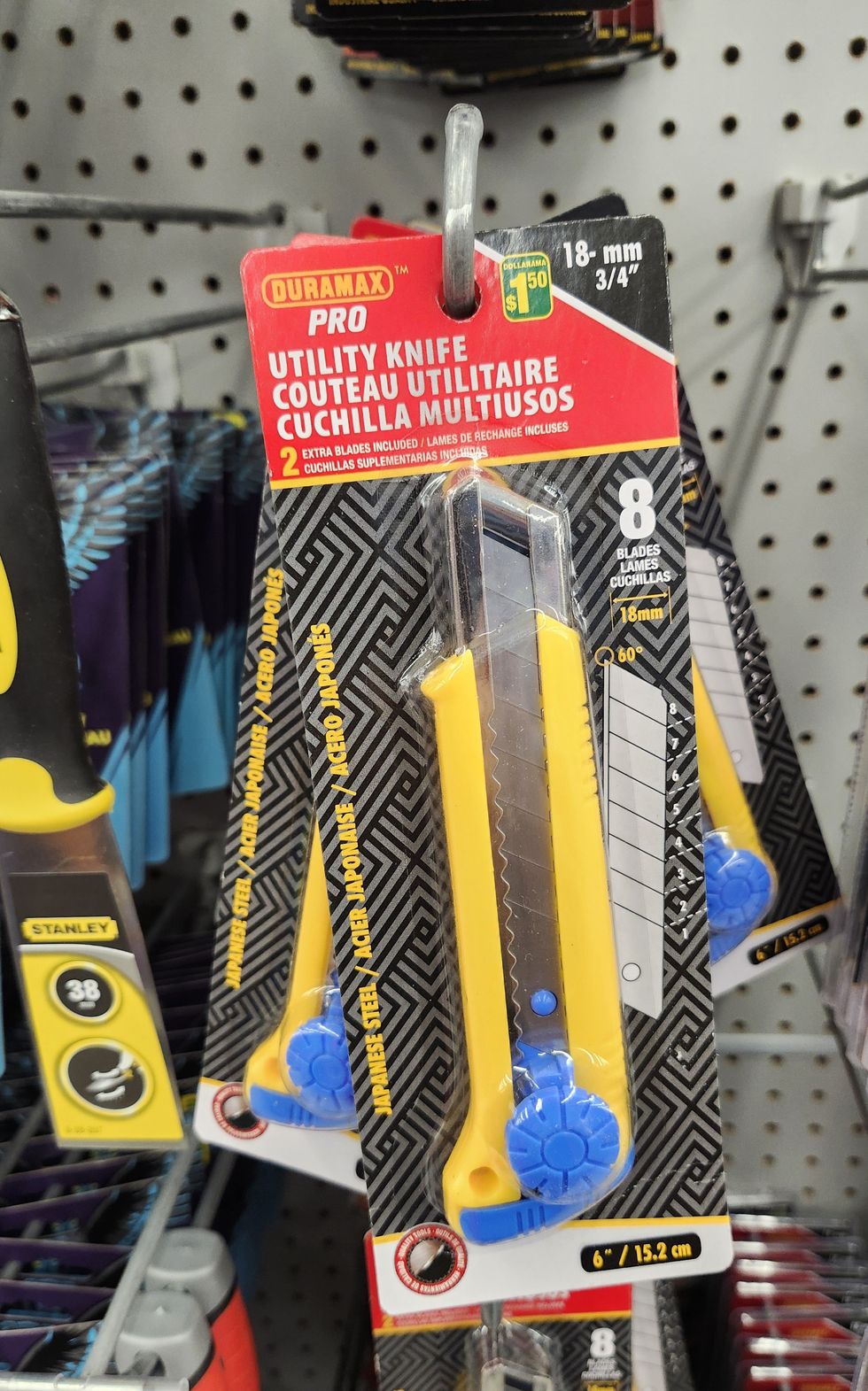 Couteau \u00e0 lame r\u00e9tractable.