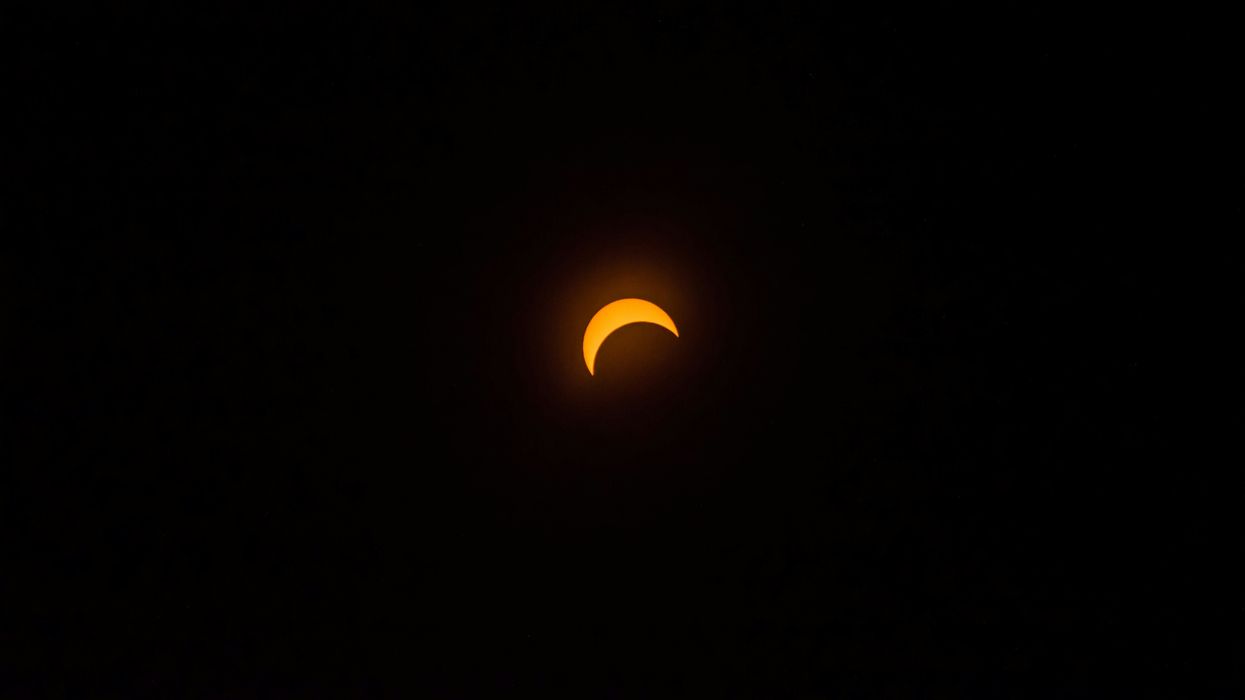 crescent sun during a partial solar eclipse