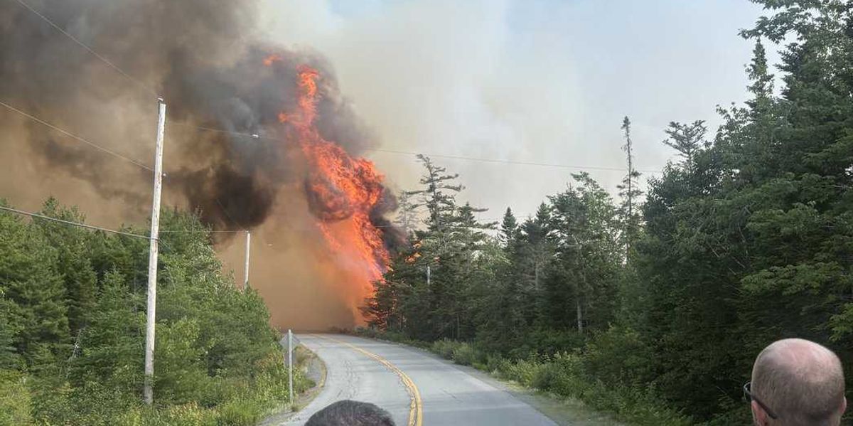 N.S. crews continue battling out-of-control wildfire northeast of Halifax N.S. crews continue battling out-of-control wildfire northeast of Halifax
