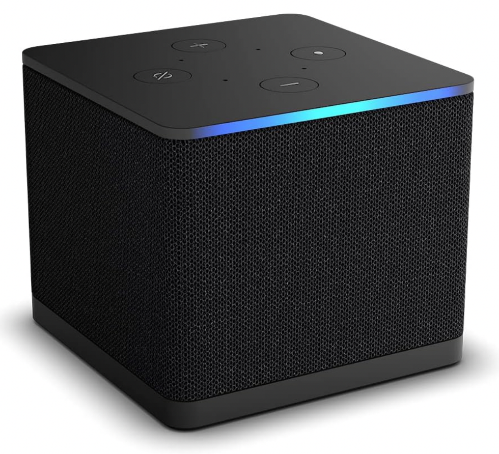 Cube \u200bAmazon Fire TV noir, qui s'illumine sur le dessus.