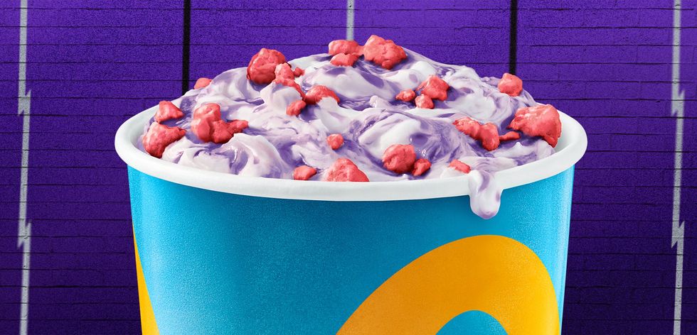 cup of the '95 mcflurry at mcdonald's with purple soft serve and red popping candy on top