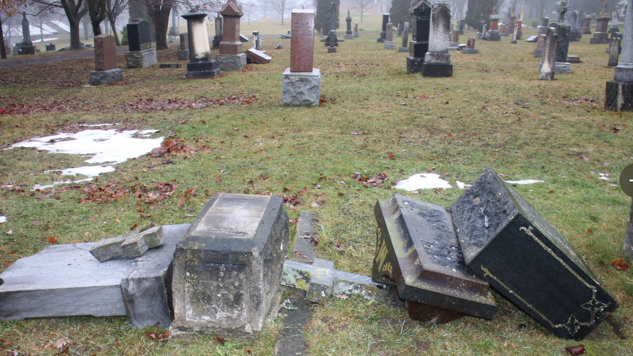 Damaged headstones at St. Vincent De Paul Cemetery in Mitchell, Ontario.