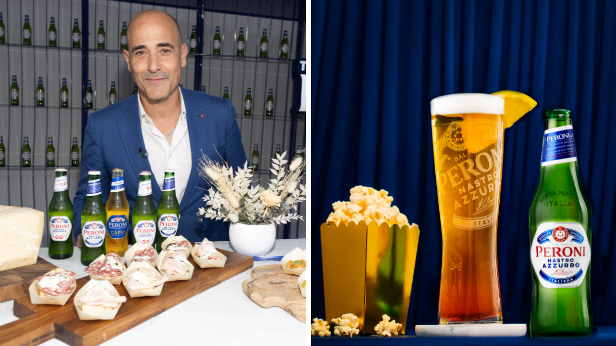 David Rocco in a blue suit stands behind a table displaying Peroni beer bottles, Italian appetizers with cured meats, and a floral centerpiece at a branded event., Right: A chilled glass of Peroni Nastro Azzurro beer with a lemon wedge sits beside a bottle of Peroni and a golden box of popcorn against a dark blue backdrop.