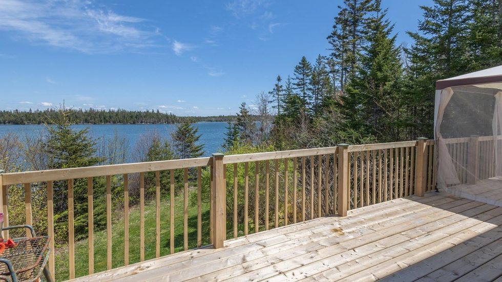 Deck at the back of the house that overlooks the ocean.