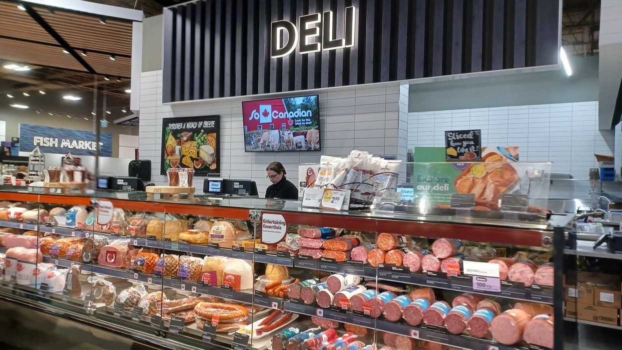 deli section with meat at grocery store in canada