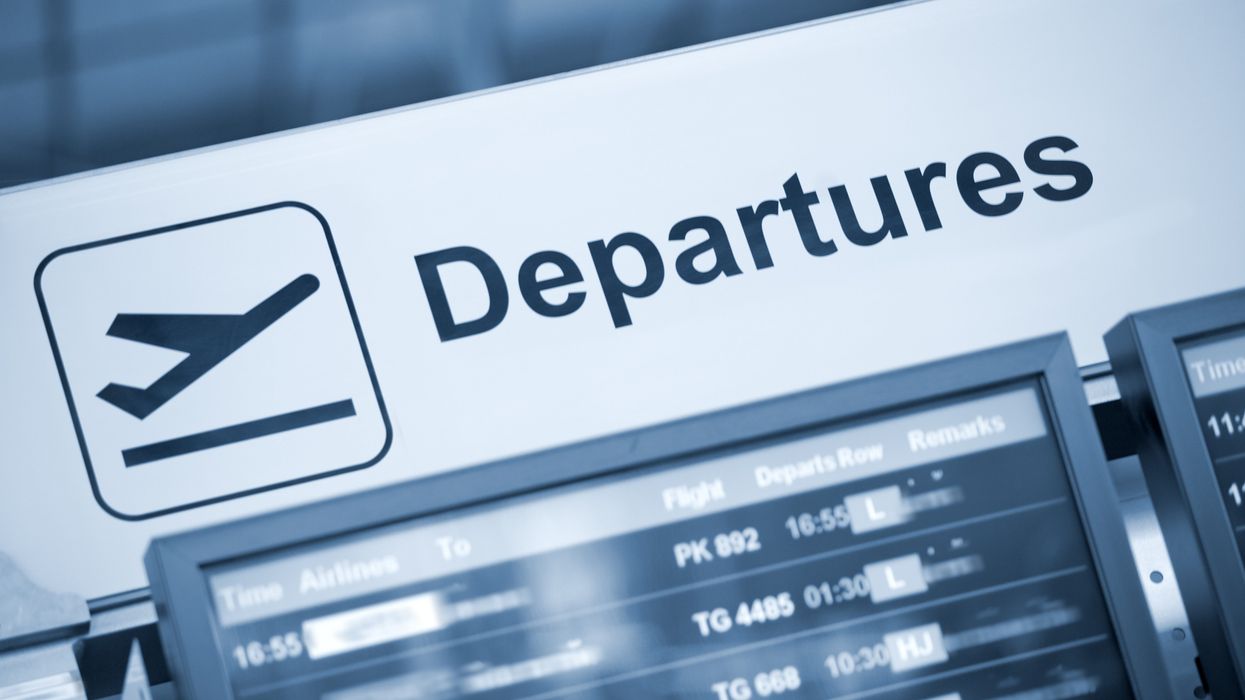 Departures sign at an airport.