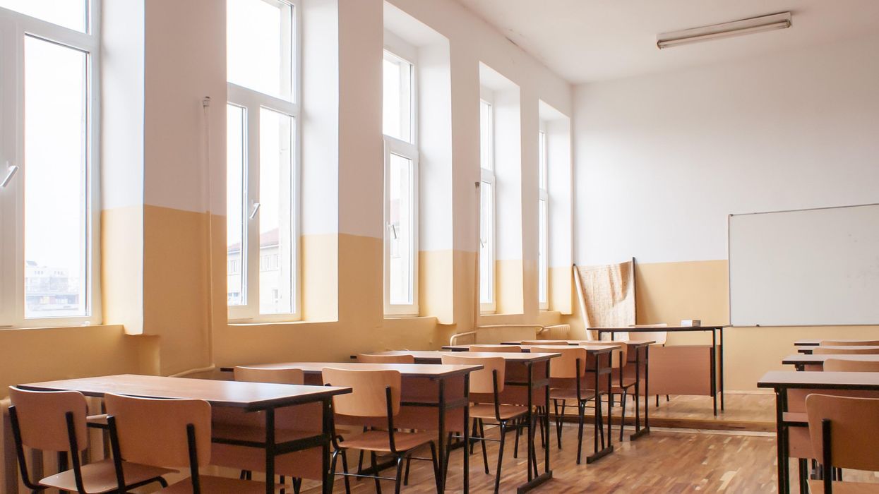 Desks in an empty classroom.