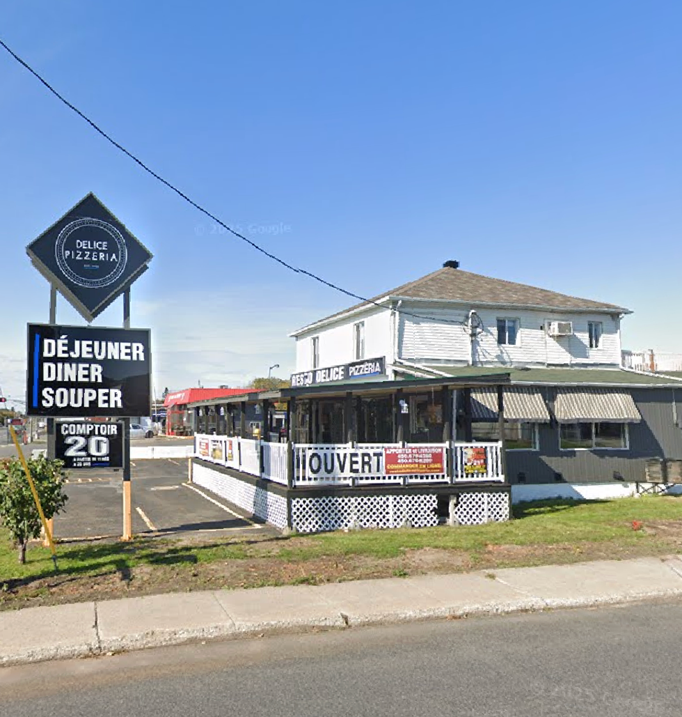 Devanture du restaurant Pizzeria Grande All\u00e9e \u00e0 Longueuil.