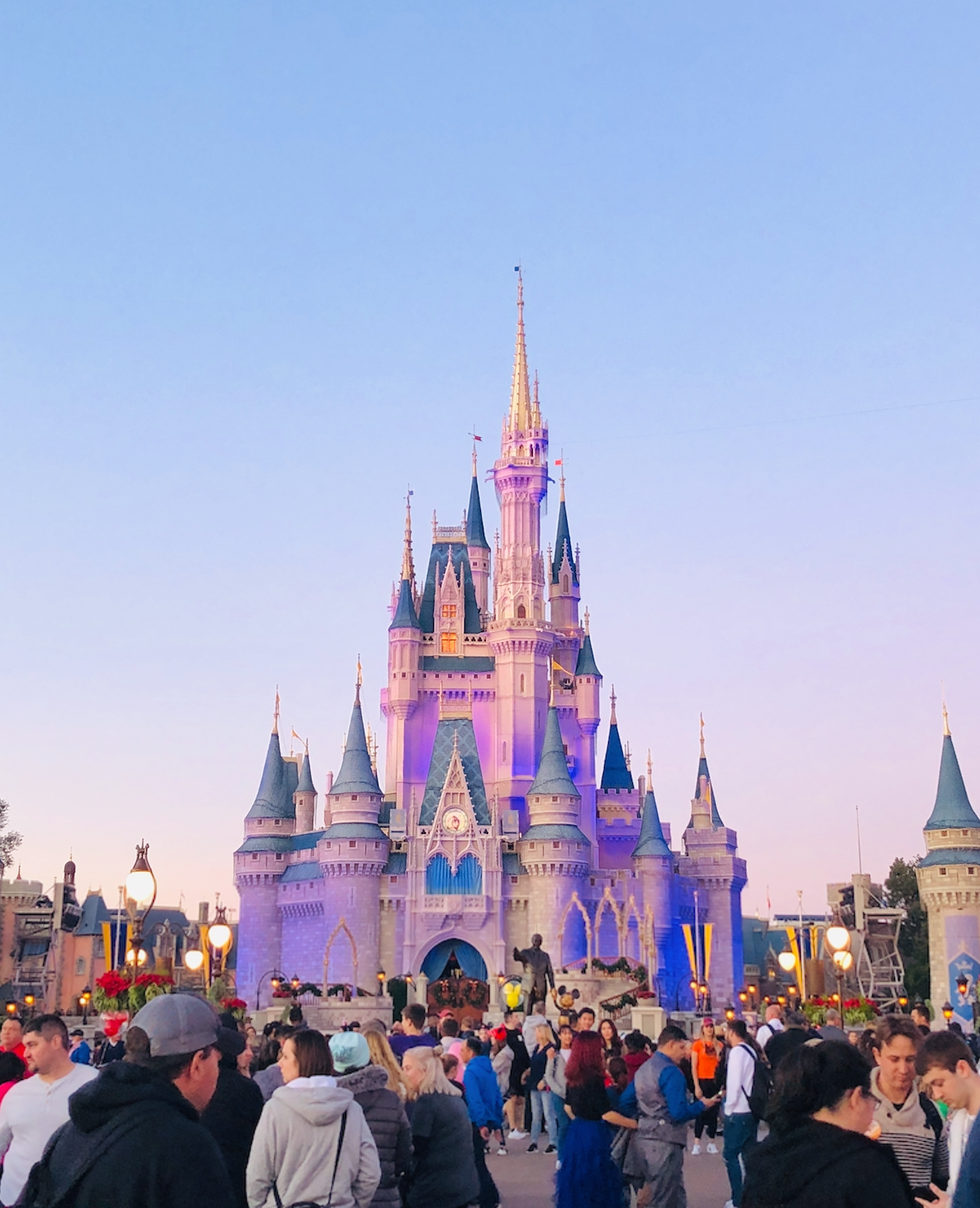 Disney World's Magic Kingdom castle looking majestic at dusk.