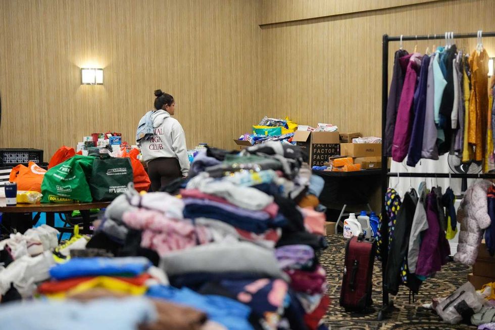 Don't return home, Ford tells wildfire evacuees