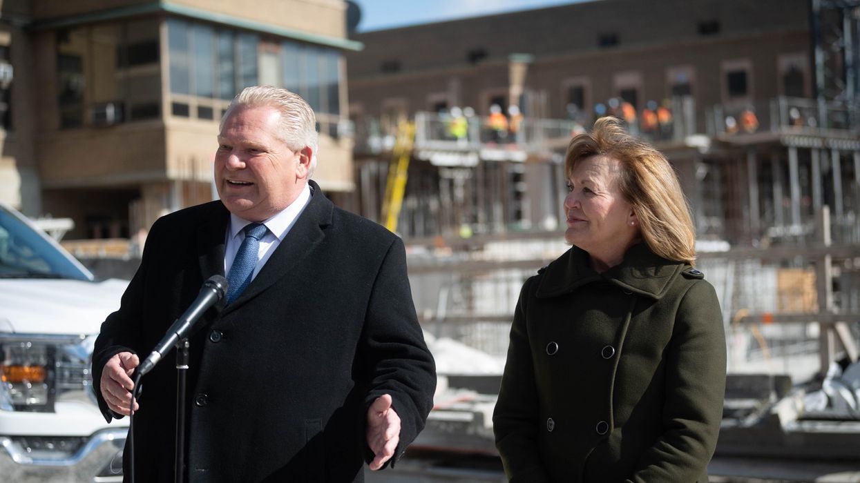 Doug Ford and Christine Elliott making an announcement.