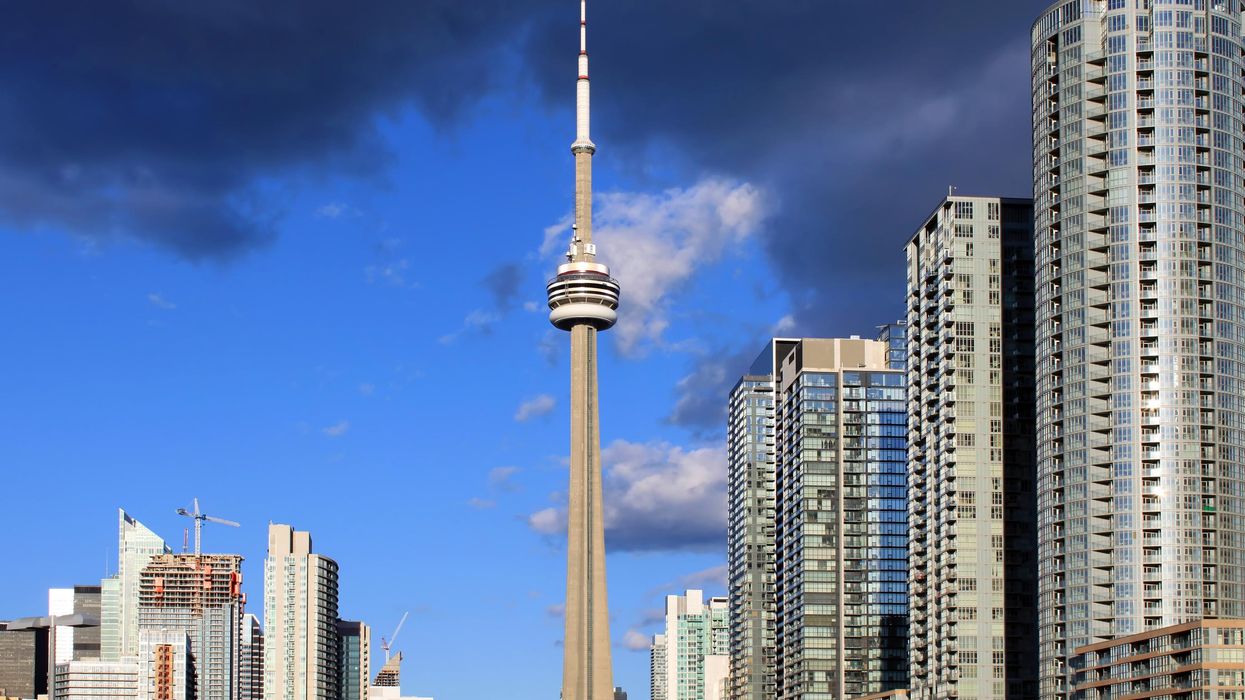 Downtown Toronto skyline with apartment buildings.
