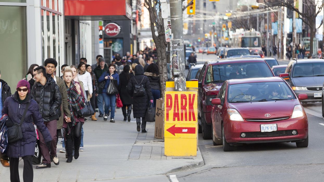 Downtown Toronto traffic on Queen Street West.