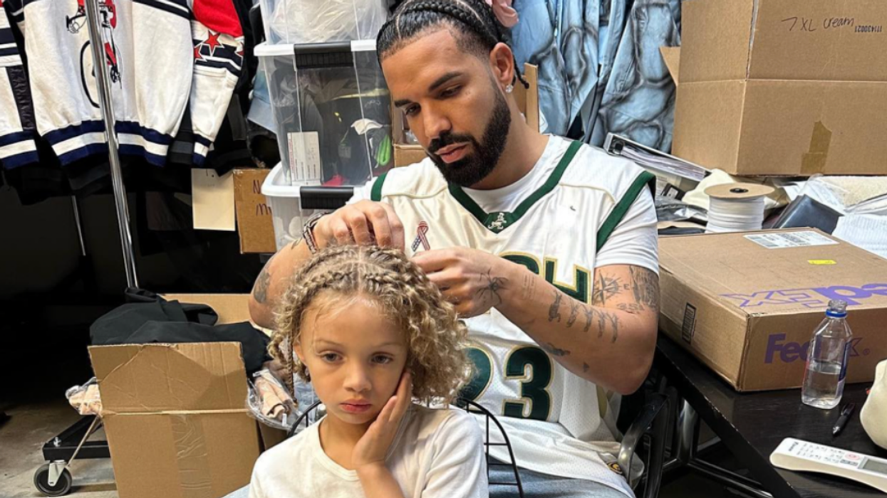 Drake braiding Adonis's hair.