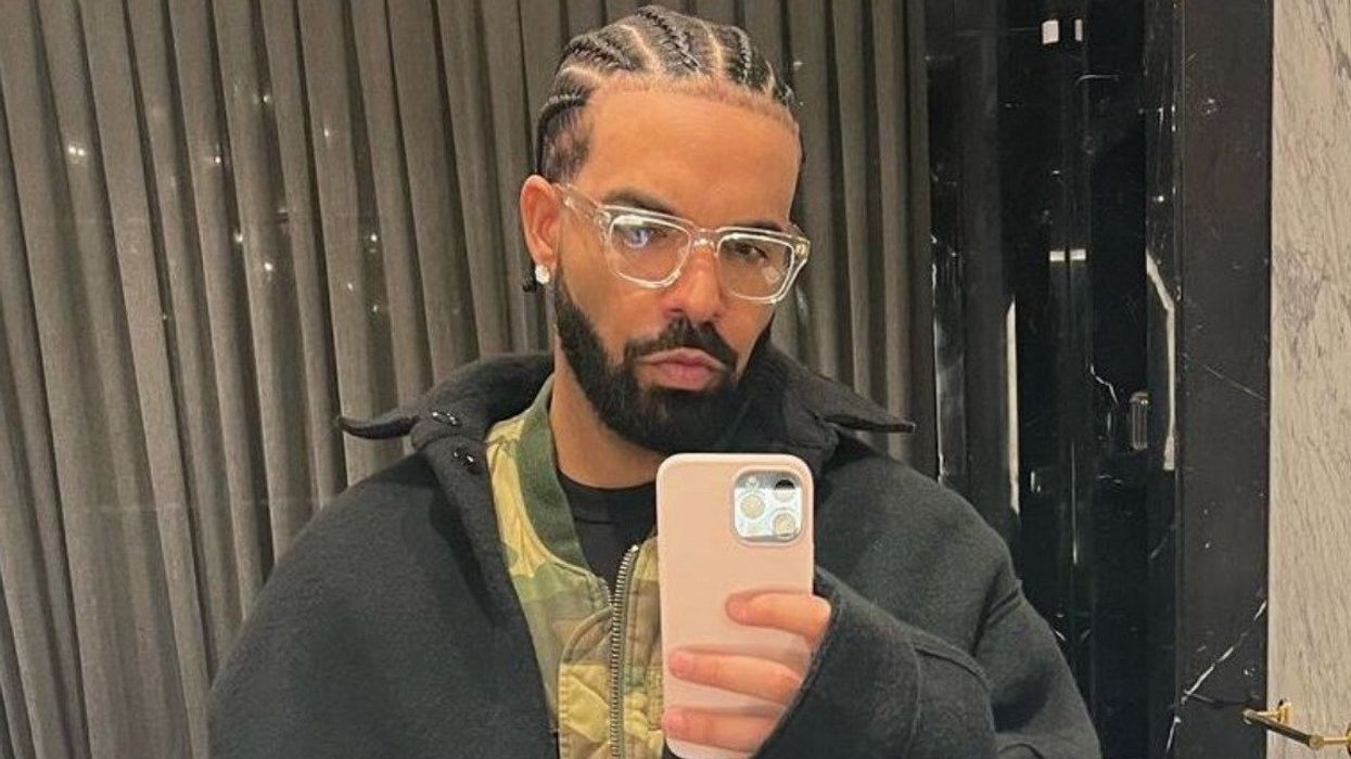 Drake taking a selfie.