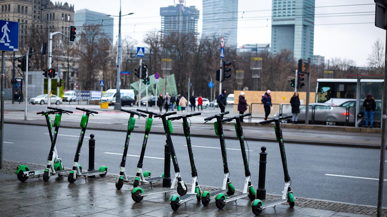 E-Scooters on a sidewalk.